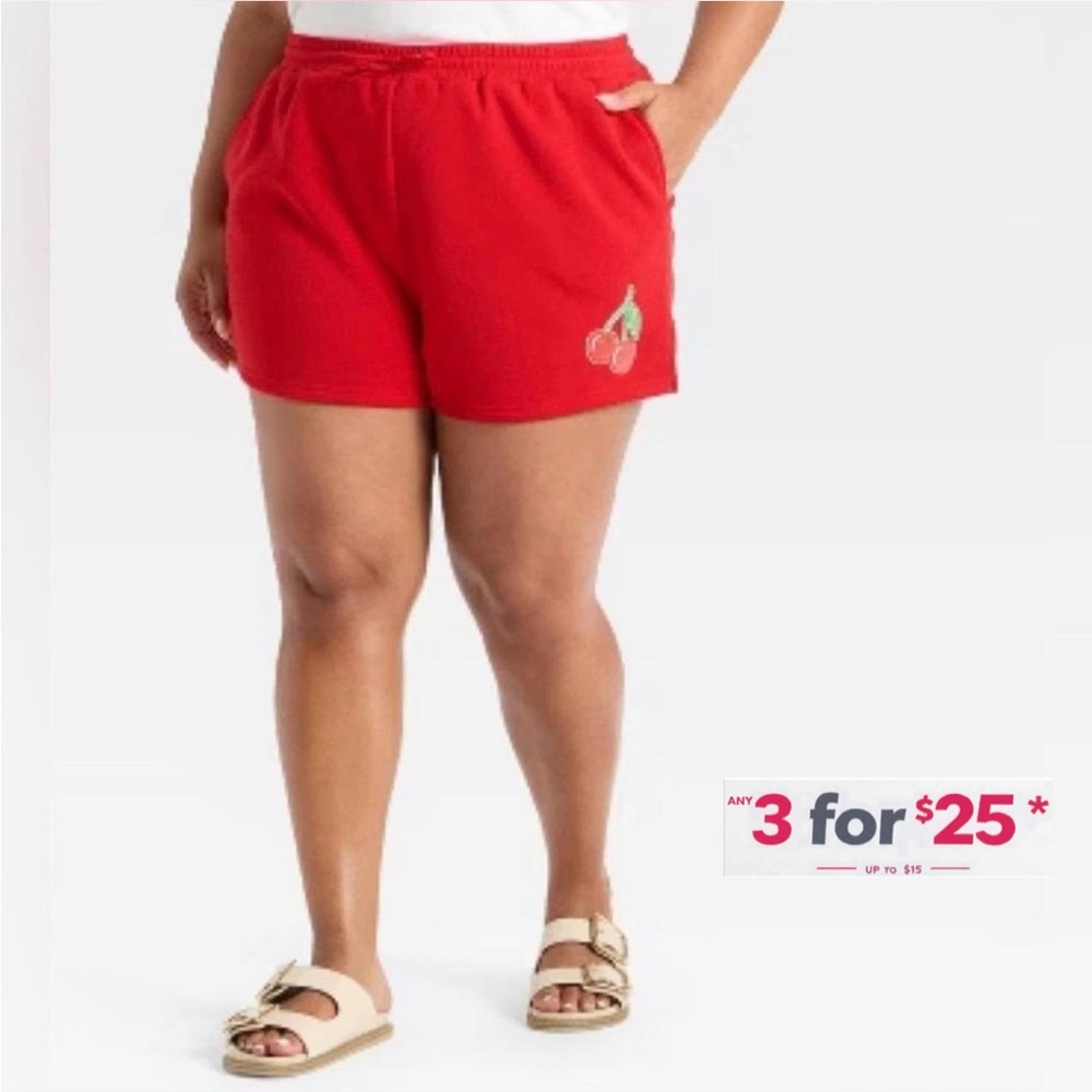 Red sweat shorts with embroidered cherry design drawstring and pockets